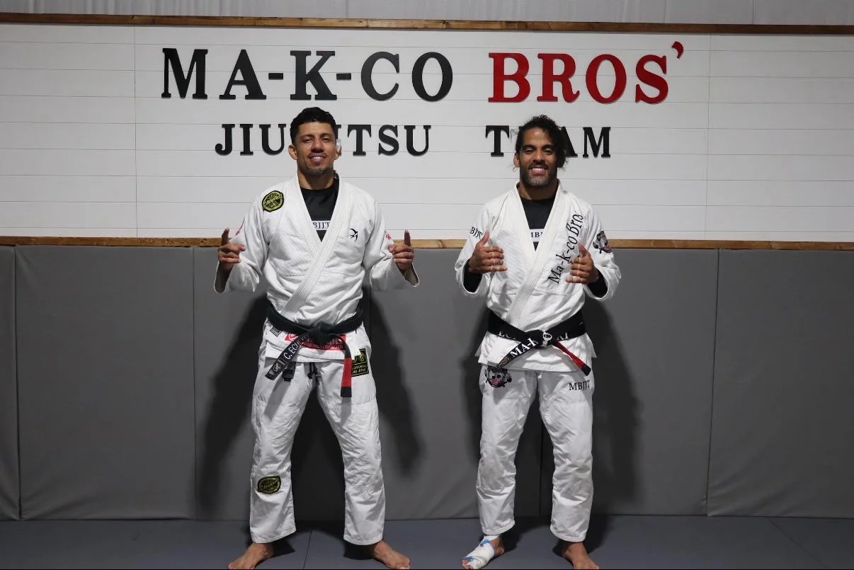 Instructor coaching a student through technique at Tampa BJJ in South Tampa