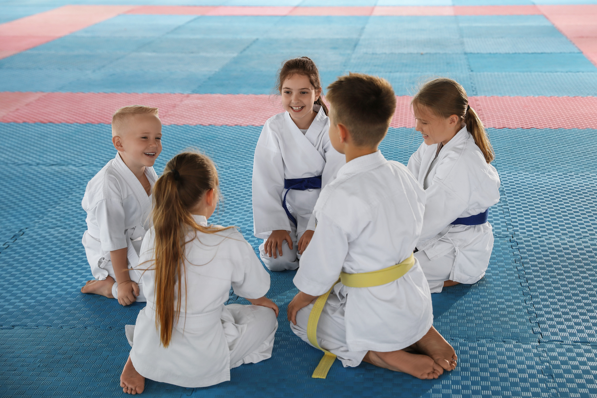 Kids practicing Brazilian Jiu-Jitsu technique in a Tampa BJJ kids class